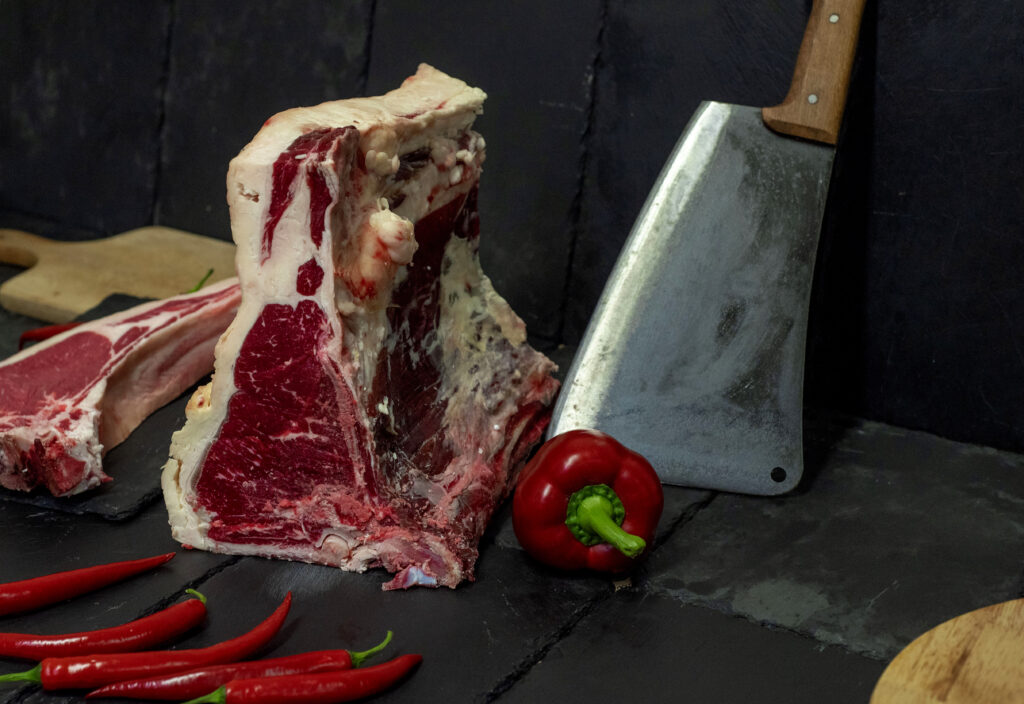 Premium dry-aged biological beef cuts with beautiful marbling at VG Paterakis butcher shop in Kissamos